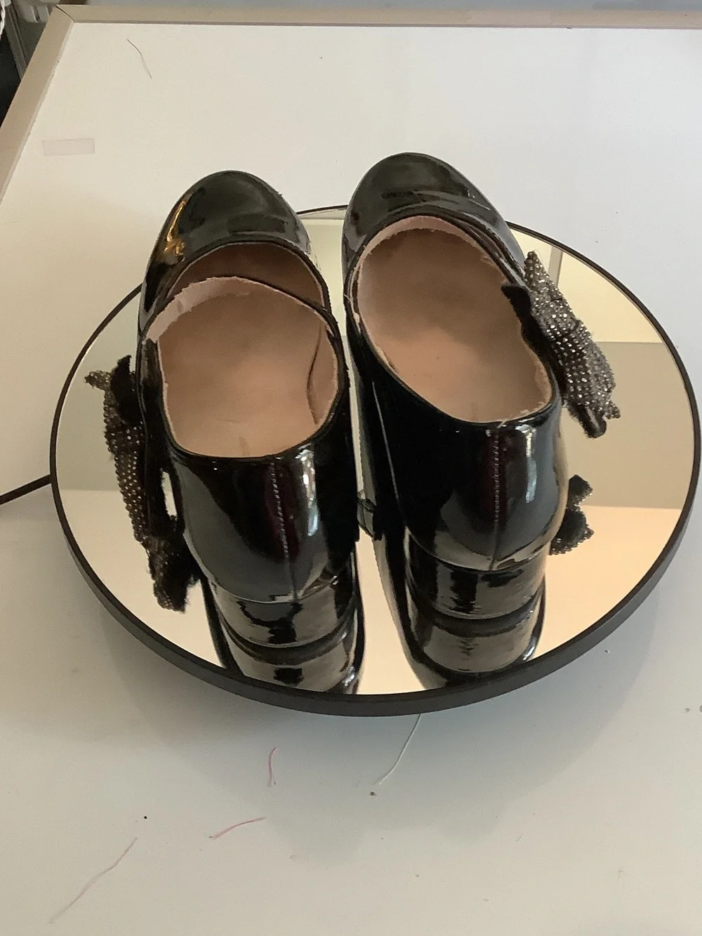 cupcakes & cashmere Black Patent Mary Jane Wedges with Embellished Bow